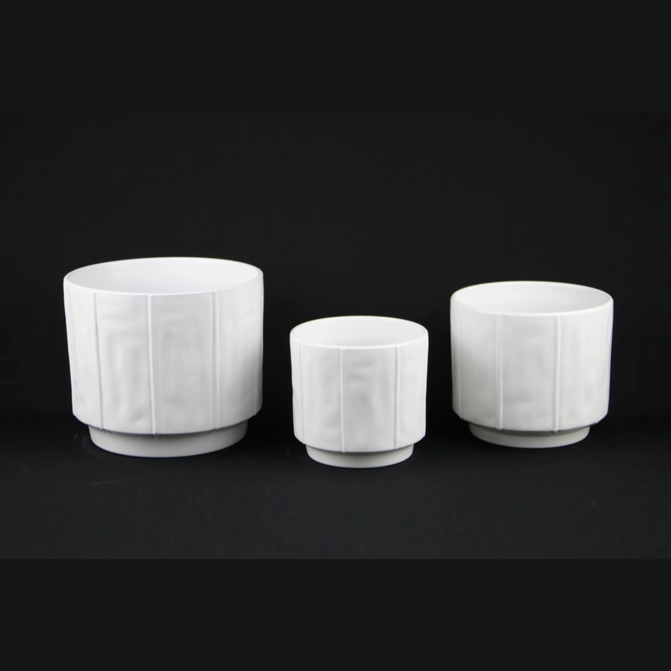 3-Piece White Stoneware Planter Pot Set with Soft Vertical Texture - Image 4