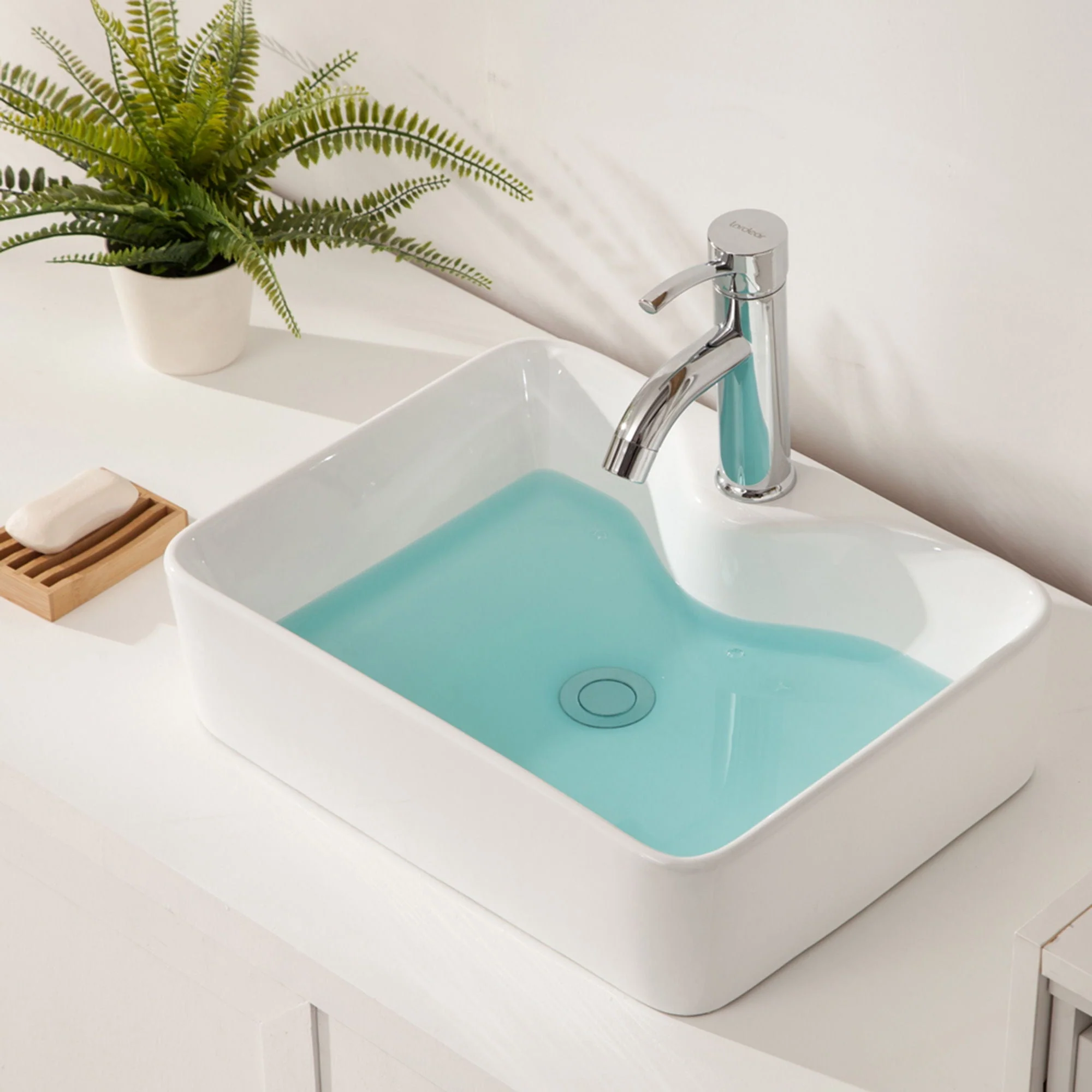 Modern Ceramic Rectangular Vessel Bathroom Sink by Couch - Image 4